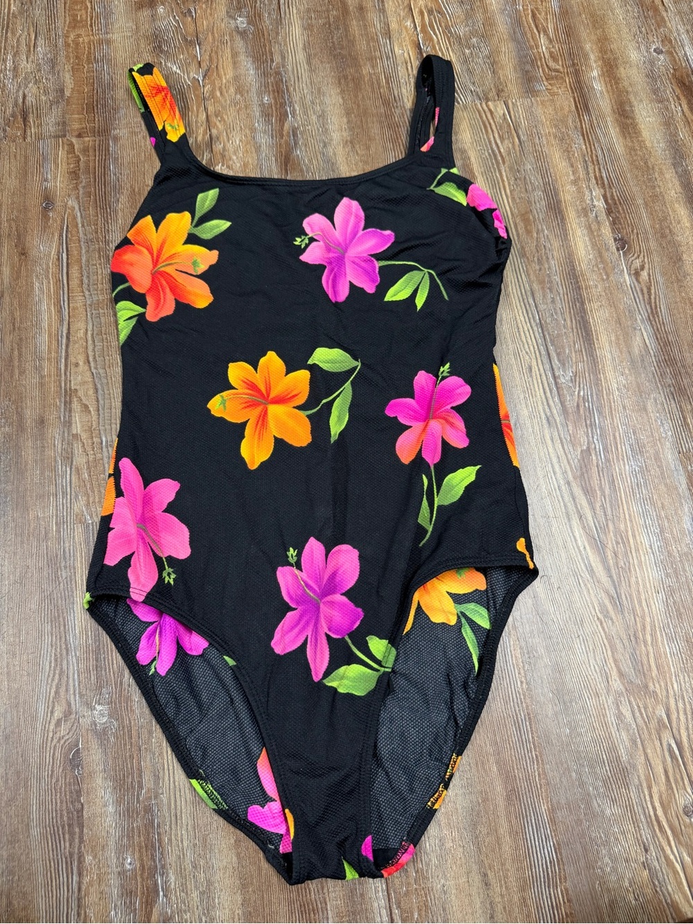Vintage 90s Black one piece swimsuit with orange and pink hibiscus flowers